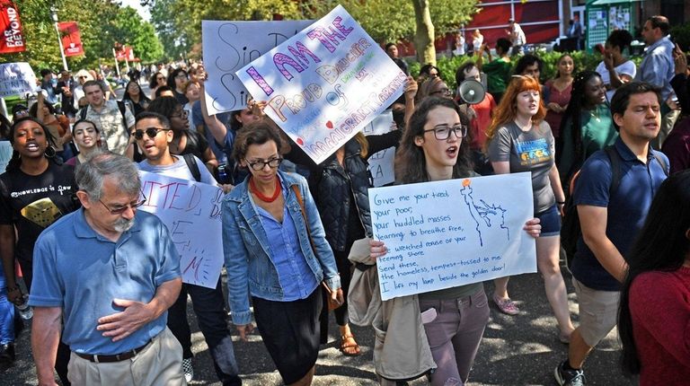 Students and Immigrant advocates march at Stony Brook