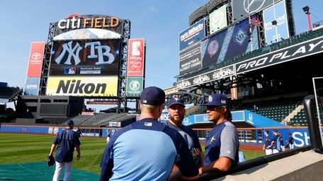 Chris Archer of the Rays talks with his