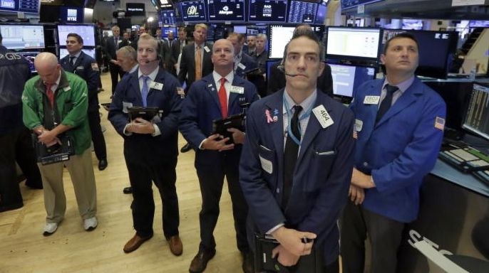 Traders on the floor of the New York