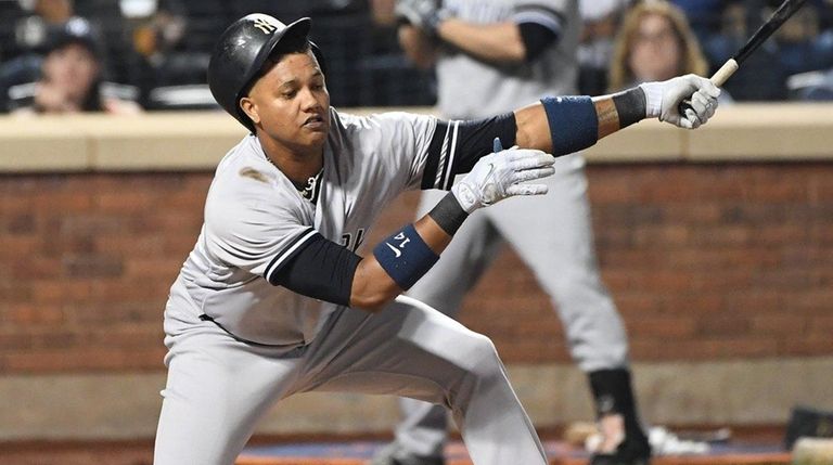 Yankees second baseman Starlin Castro strikes out against
