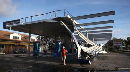 The roof of a gas station is shown