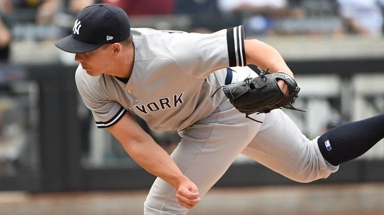 Yankees reliever Chad Green delivers against the Rays