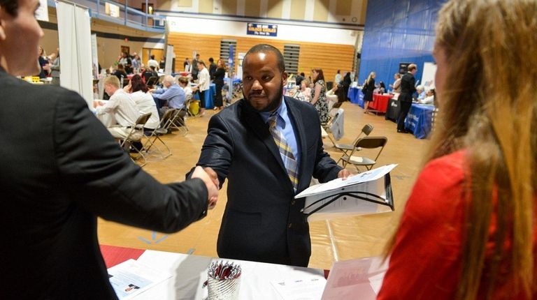Job seeker Clease Allen, of Shirley, attends the
