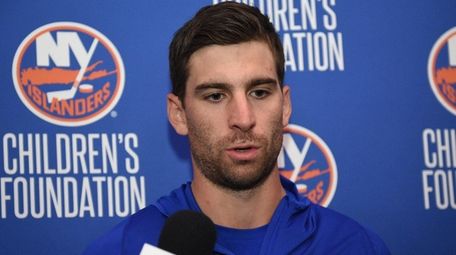 New York Islanders forward John Tavares speaks to