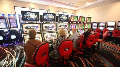 Patrons take to the slot machines at Jake's