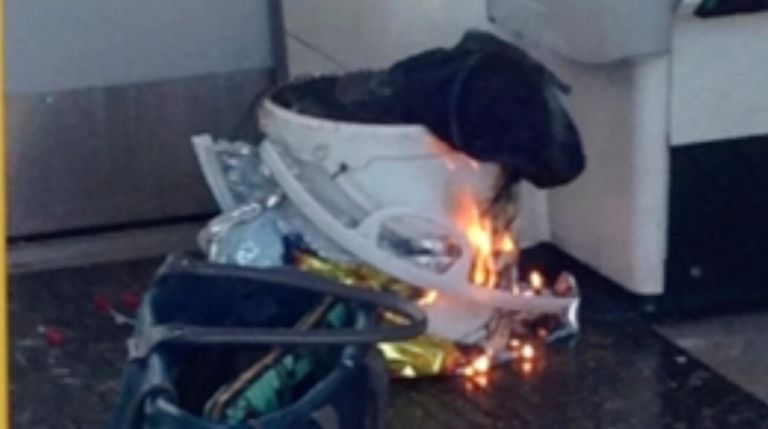In this image made from video, fire raises