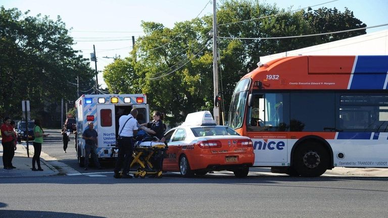 Emergency personnel respond to a crash involving a