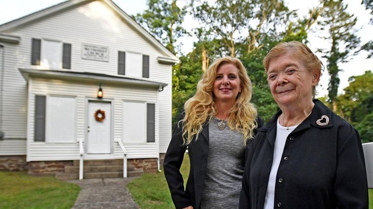 President Kimm Schmidt, left, and past president Joan