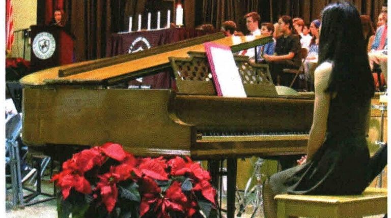 Kidsday reporter Stephanie Lee at the piano for