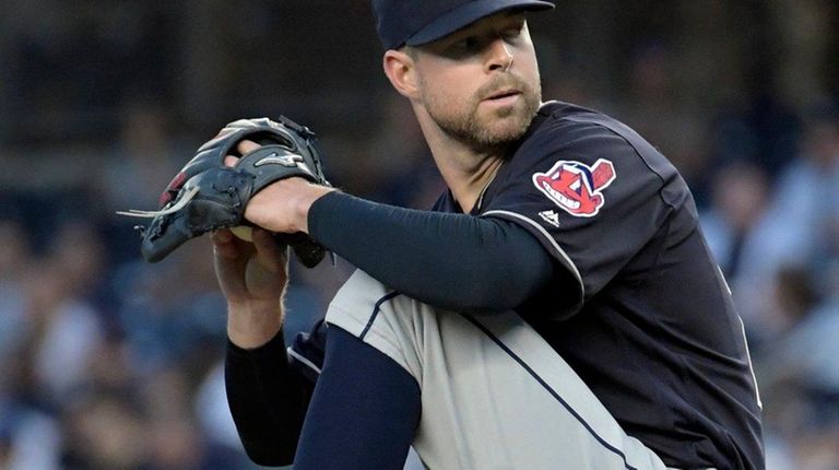 Cleveland Indians pitcher Corey Kluber delivers the ball