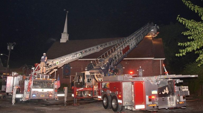 Firefighters at the scene of a church fire