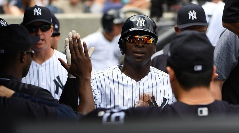 Yankees shortstop Didi Gregorius is greeted in the