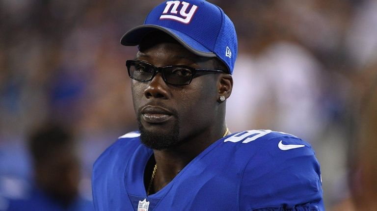 Giants defensive end Jason Pierre-Paul looks on from