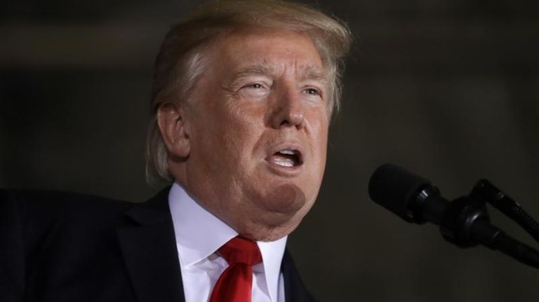 President Donald Trump speaks to military personnel and