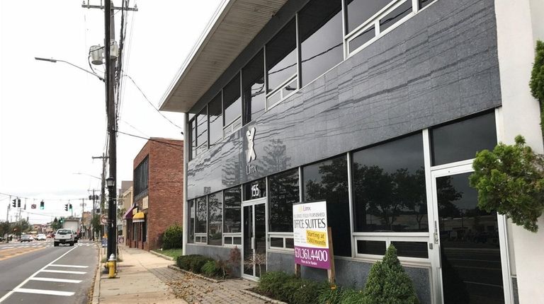 Vacant storefronts on Main Street in Smithtown on