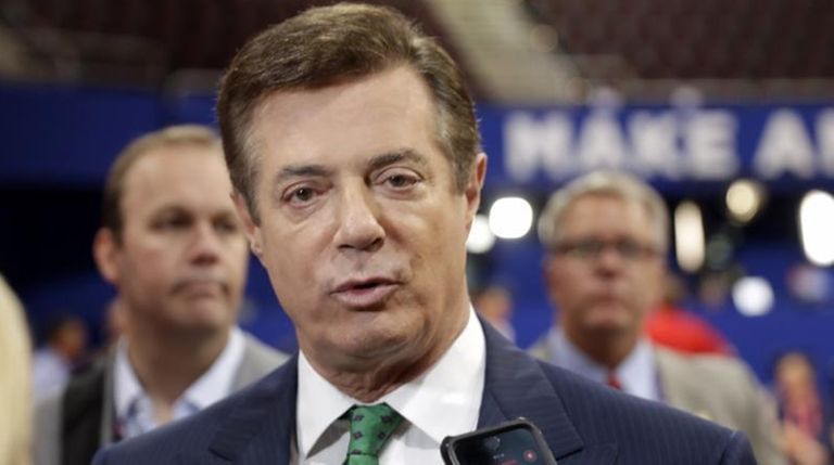 Then-Trump Campaign Chairman Paul Manafort talks to reporters