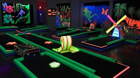 A new glow-in-the-dark indoor mini-golf venue opened this