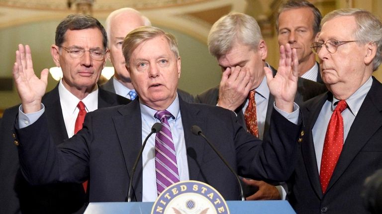 Sen. Lindsey Graham speaks to reporters in Washington