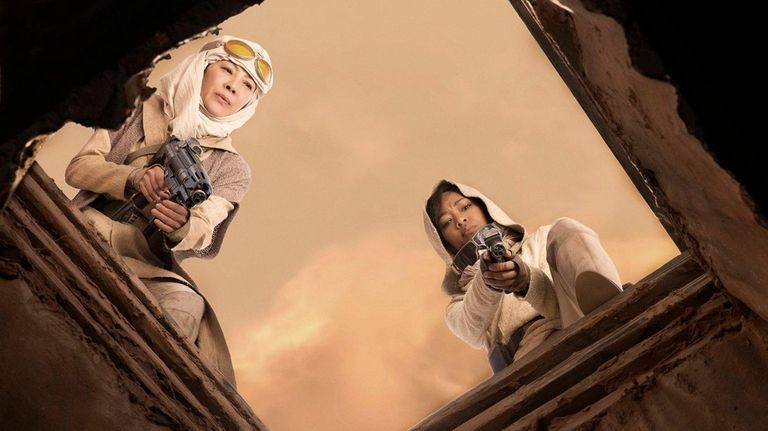 Michelle Yeoh, left, is captain Philippa Georgiou, and