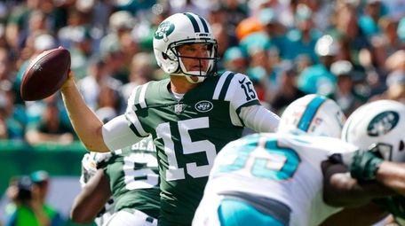 Josh McCown of the Jets throws a pass