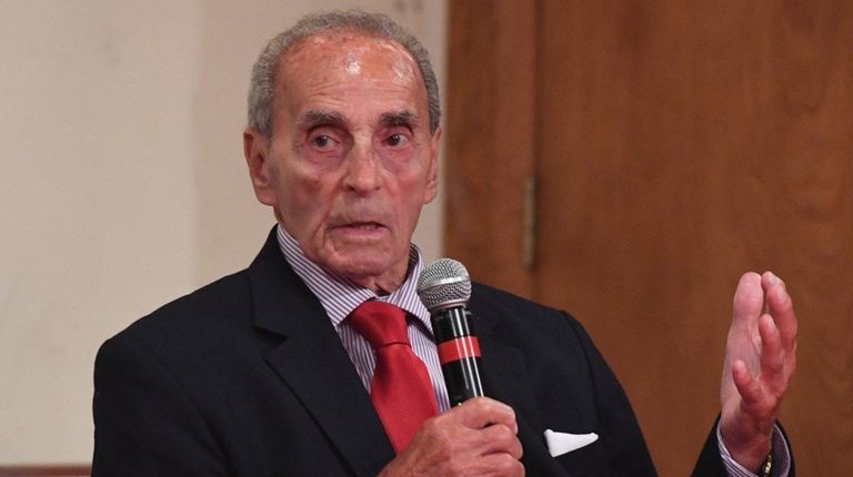 Patrick Vecchio speaks during a debate held by