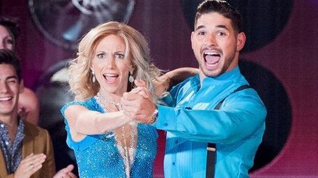 Debbie Gibson and partner Alan Bersten dance a