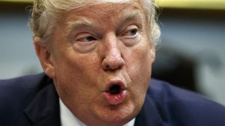 President Donald Trump speaks during a meeting in