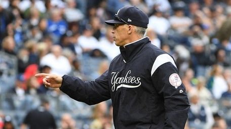 New York Yankees manager Joe Girardi walks to