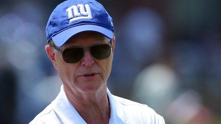 Giants co-owner John Mara on the field during