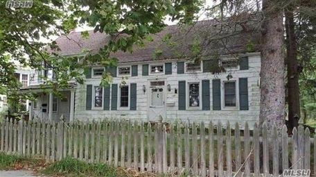 The Center Moriches residence is divided into four,