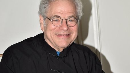 Violinist Itzhak Perlman attends the screening of the