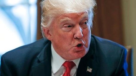 President Donald Trump speaks during a briefing with