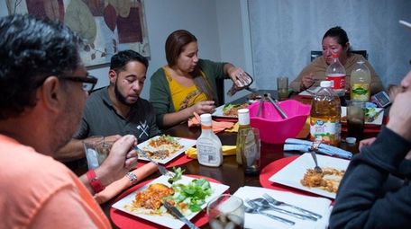 From foreground left: Miguel Caraballo Pietri, Angel Gonzalez,
