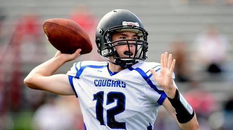Jay Morwood of Centereach looks to pass against