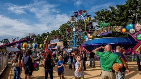 The unseasonably warm 80-degree weather drew throngs of