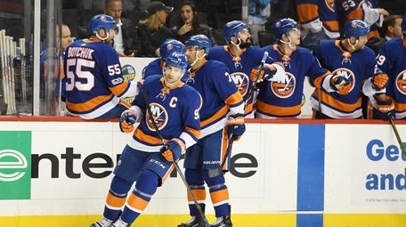 John Tavares of the Islanders being congratulated by