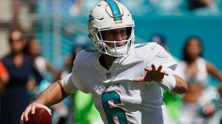 Dolphins quarterback Jay Cutler looks to pass the