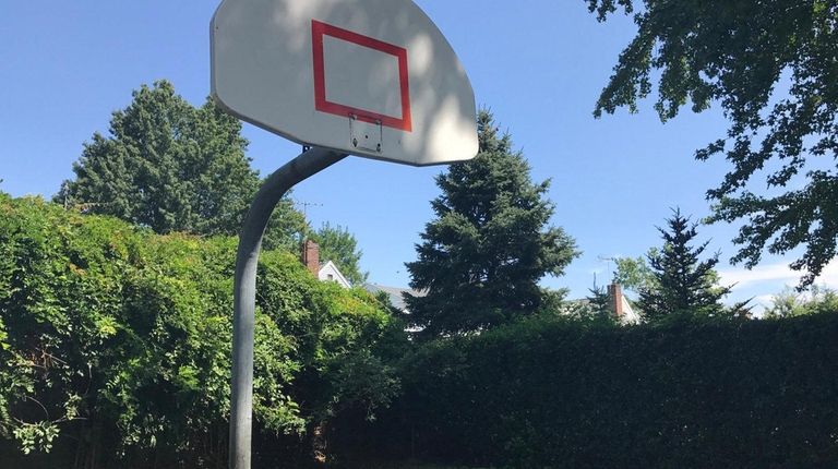 Village officials in August had removed the hoops