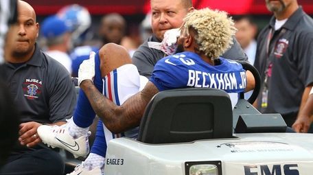 Giants receiver Odell Beckham Jr. is tended to