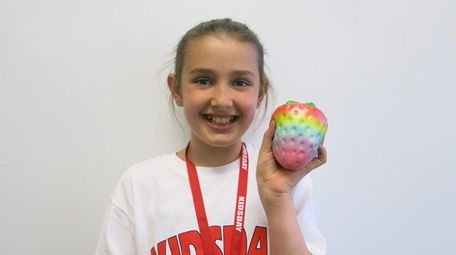 Kidsday reporter Ava Leitner of Huntington holds her
