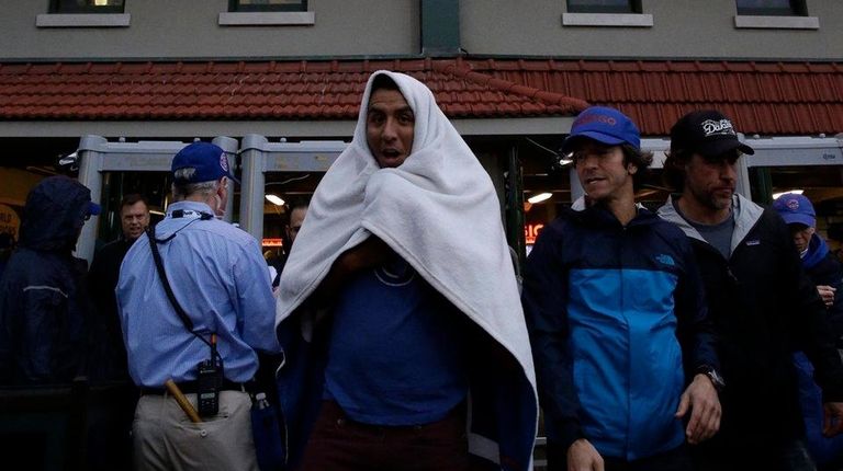 Fans leave Wrigley Field after Game 4 of