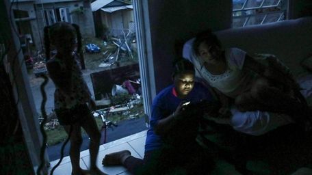 Young people gather in a home in San