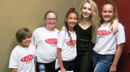 Actress and singer Sabrina Carpenter with Kidsday reporters,