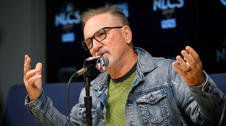 Cubs manager Joe Maddon speaks during a press