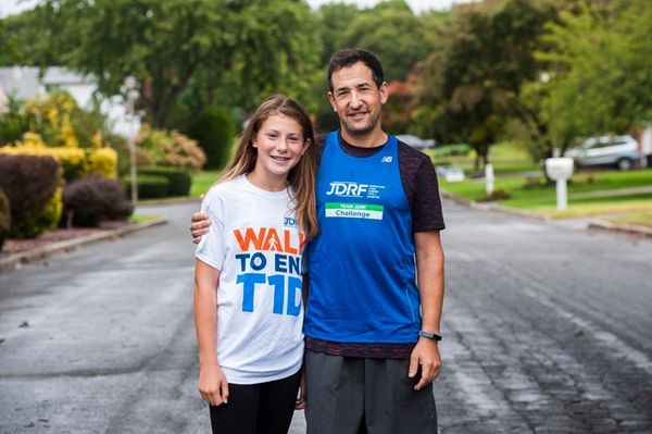 Michael Ehrlich, with daughter Rachael, 13, near their