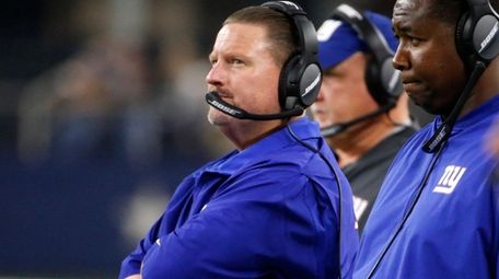 New York Giants head coach Ben McAdoo watches