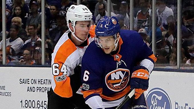New York Islanders defenseman Ryan Pulock controls the