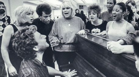 Songwiter Ellie Greenwich, center, rehearses with the cast