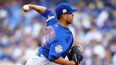 Jose Quintana of the Chicago Cubs throws a