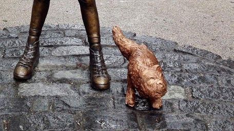 Gardega placed his sculpture of a urinating dog